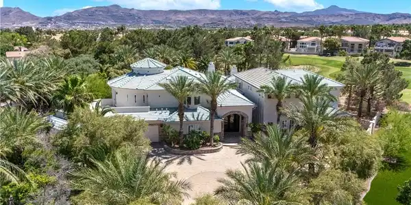 Image 3: An aerial perspective reveals a grand estate nestl