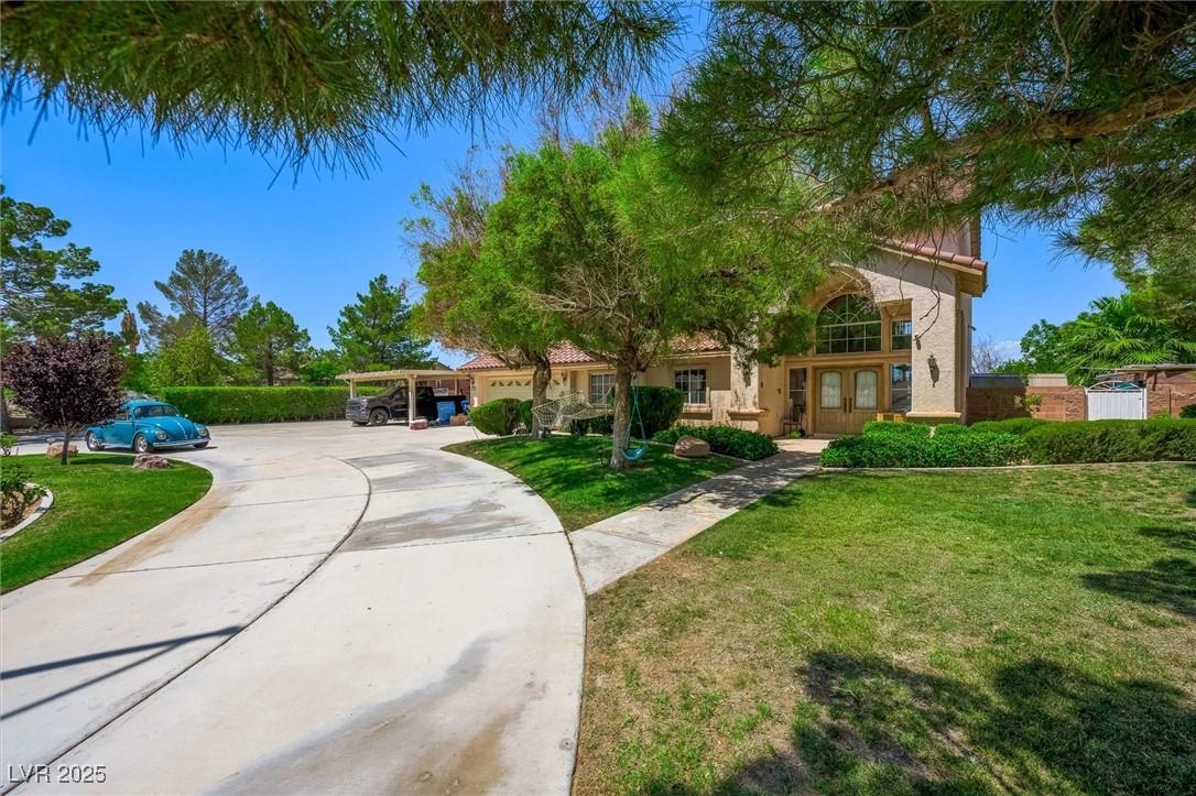 Image 2: Mediterranean / spanish-style home with french doo