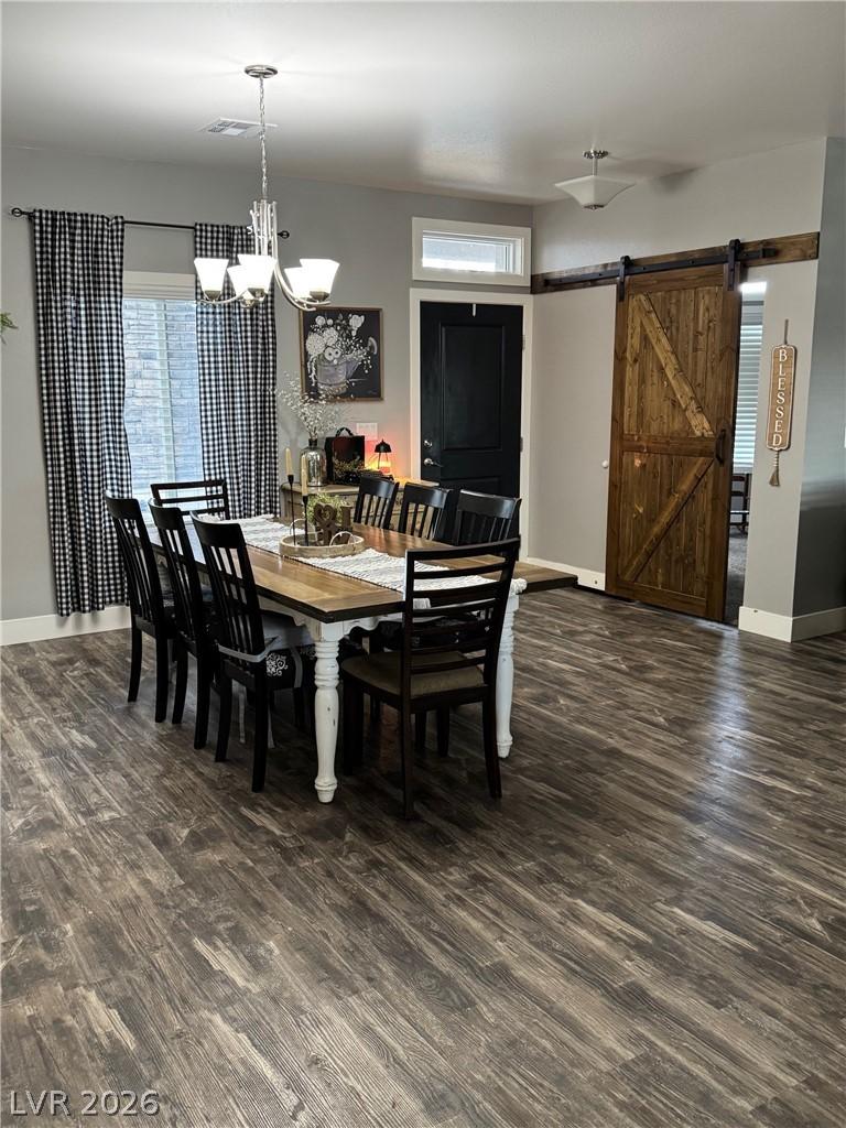 Image 2: Dining space with healthy amount of natural light,