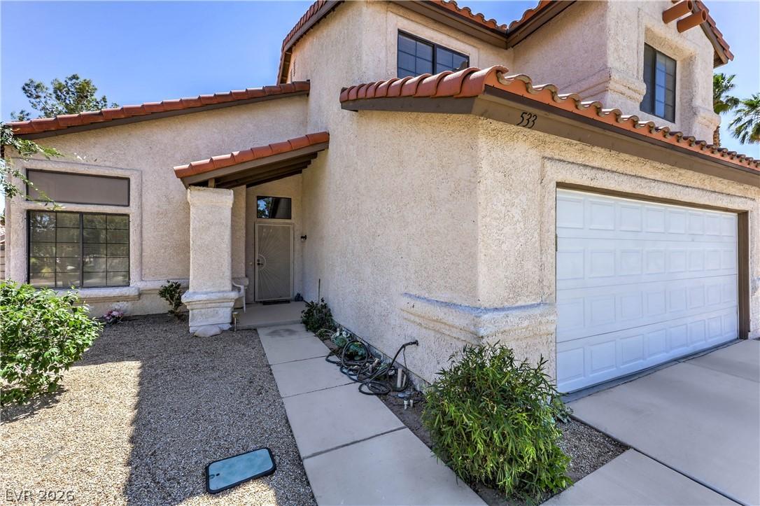Image 3: This residence features a convenient garage, a wel