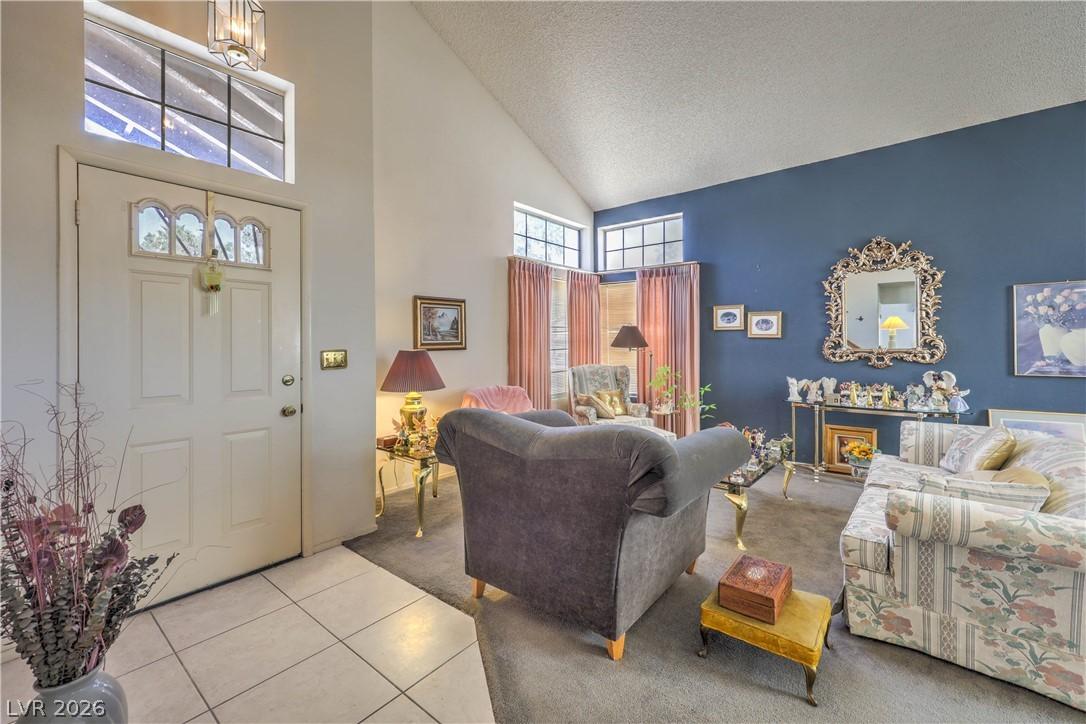 Image 4: Enter into this inviting living space featuring a