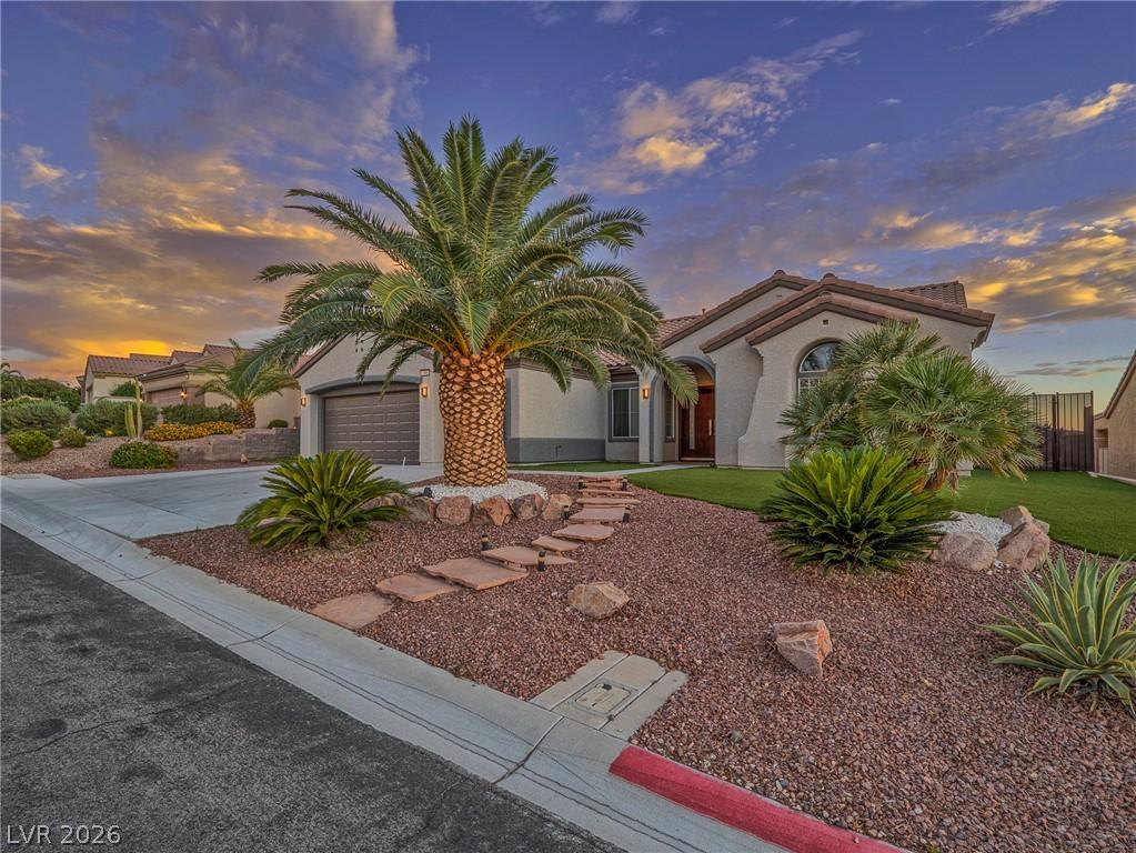 Image 4: Dramatic sunset hues enhance this home's desert-fr