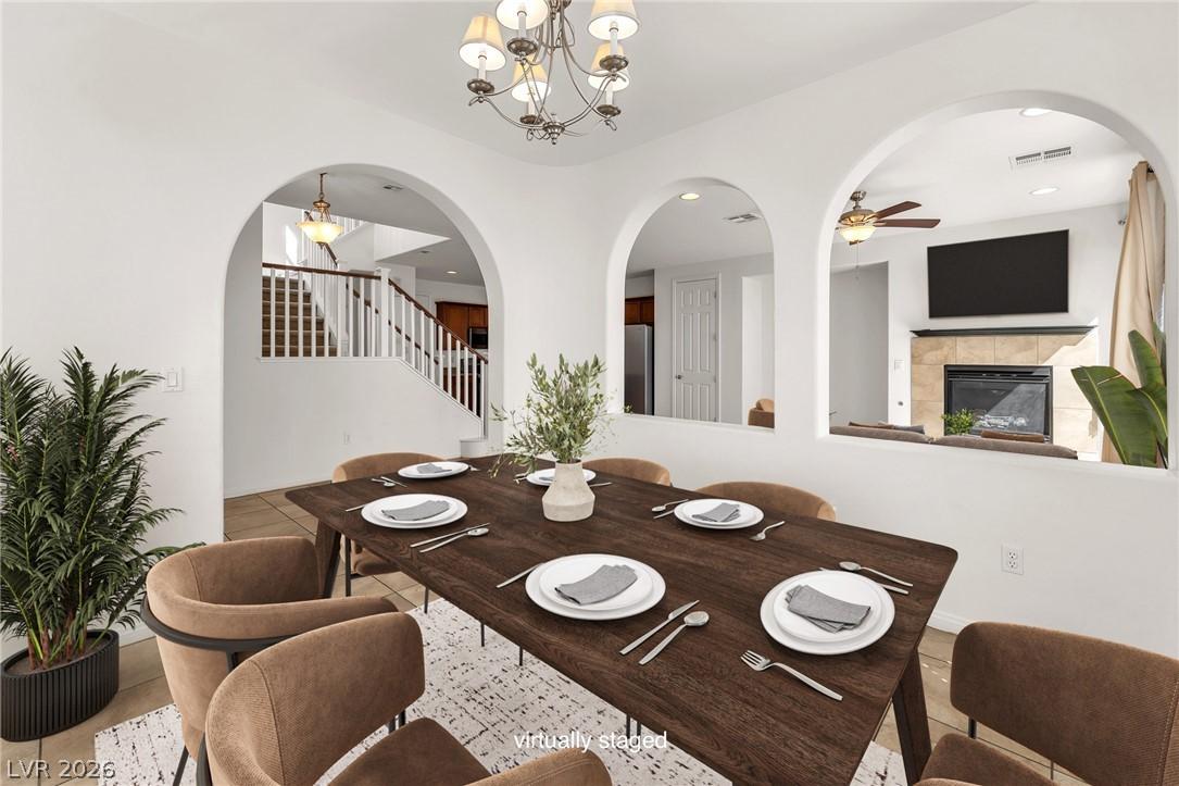 Image 3: This dining room offers a comfortable atmosphere w