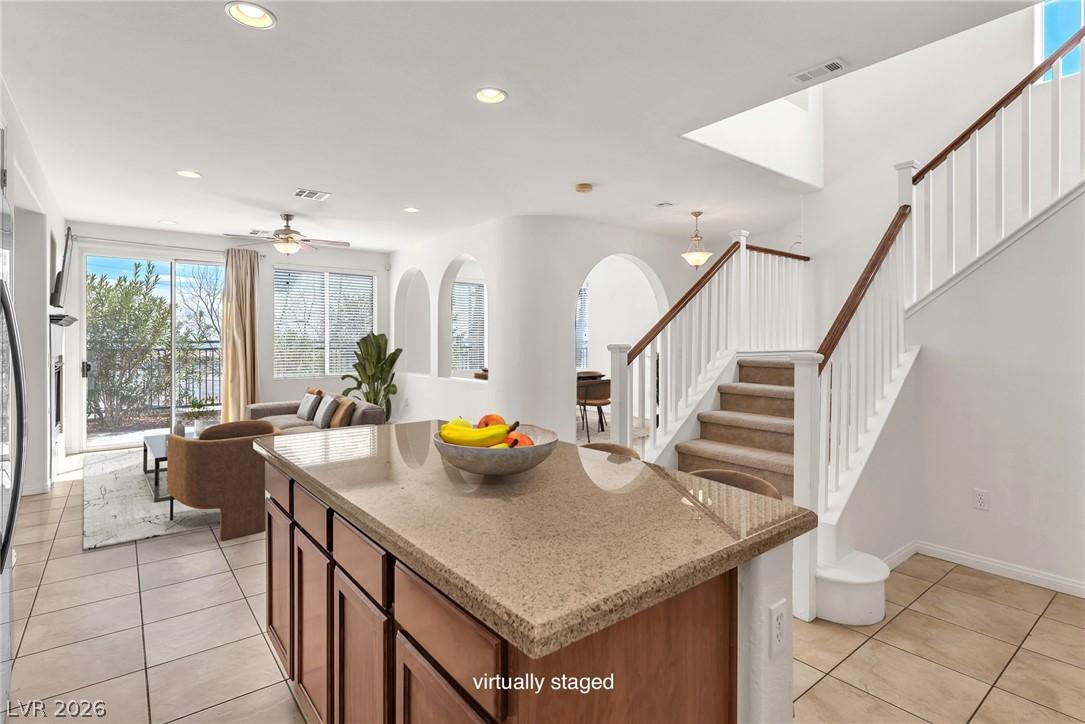 Image 4: Bright, open concept living area featuring a funct