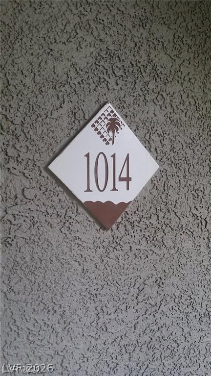 Image 4: This outdoor detail shot features a clear address