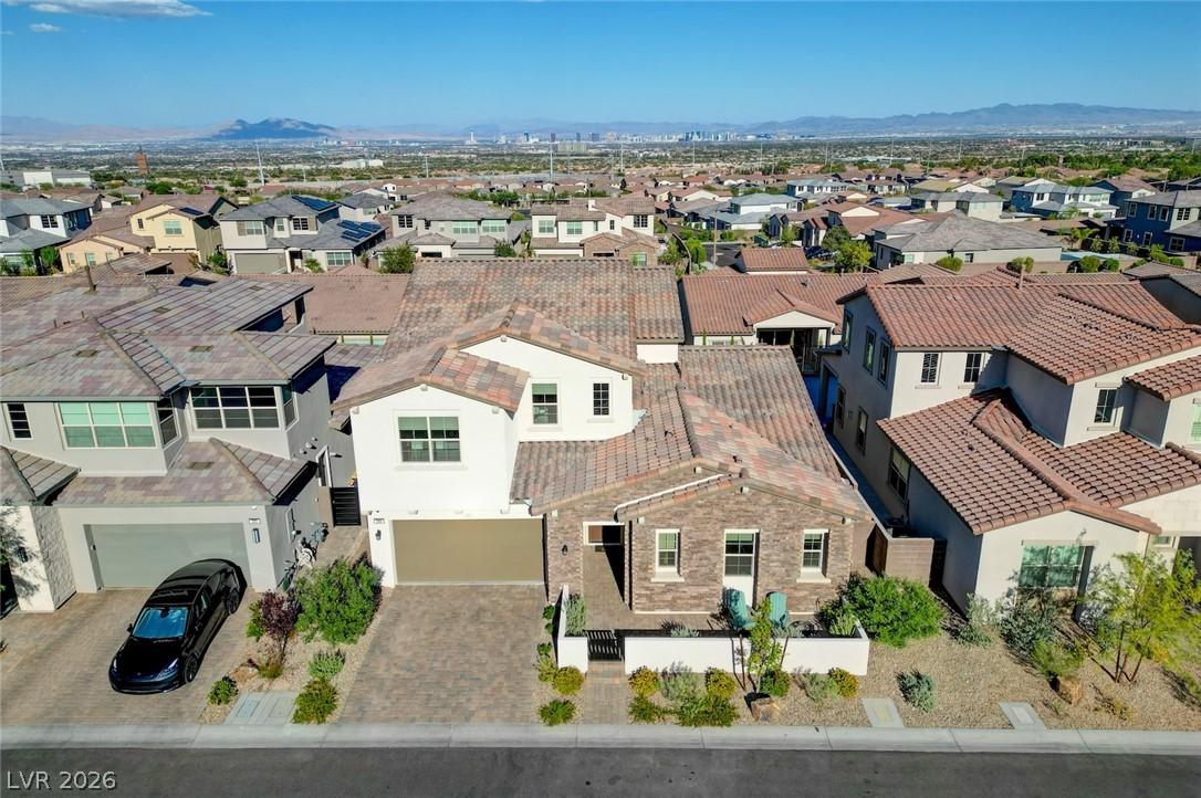 Image 4: An aerial perspective reveals a charming residence