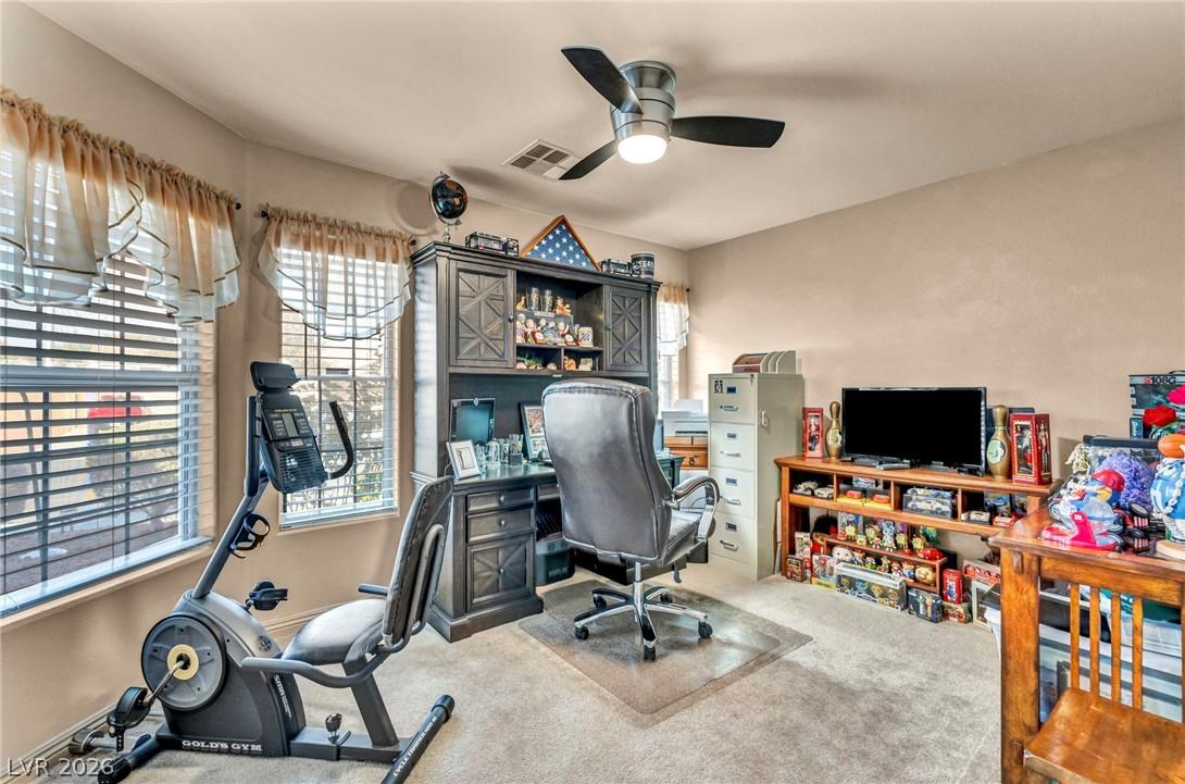 Image 4: This versatile room offers a functional office spa