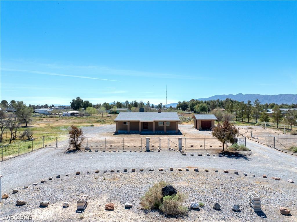 Image 2: View of front of home featuring a view of countrys