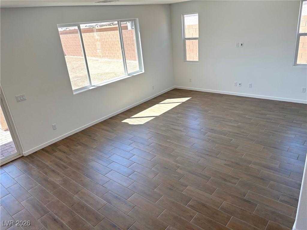 Image 4: Great  room featuring baseboards and porcelain til