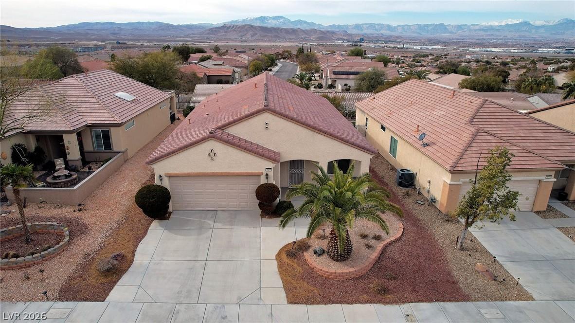 Image 2: A terracotta-tiled roof crowns this residence, fea
