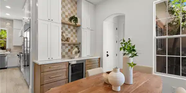 Image 2: A well-appointed kitchen features a beverage coole