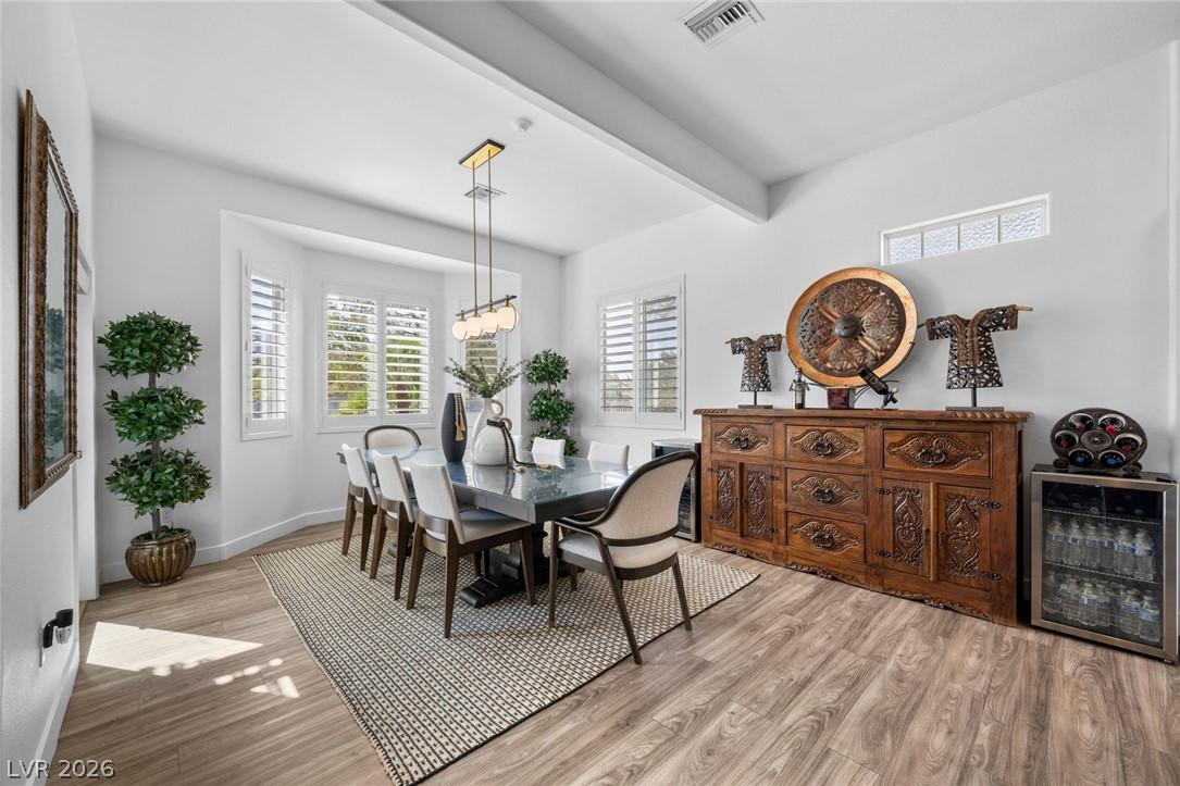 Image 4: Natural light floods this dining area, highlightin