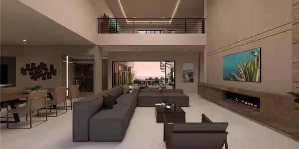 Image 4: An airy living area with soaring ceilings and a un