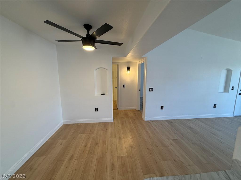 Image 4: Clean lines and light wood flooring define this op