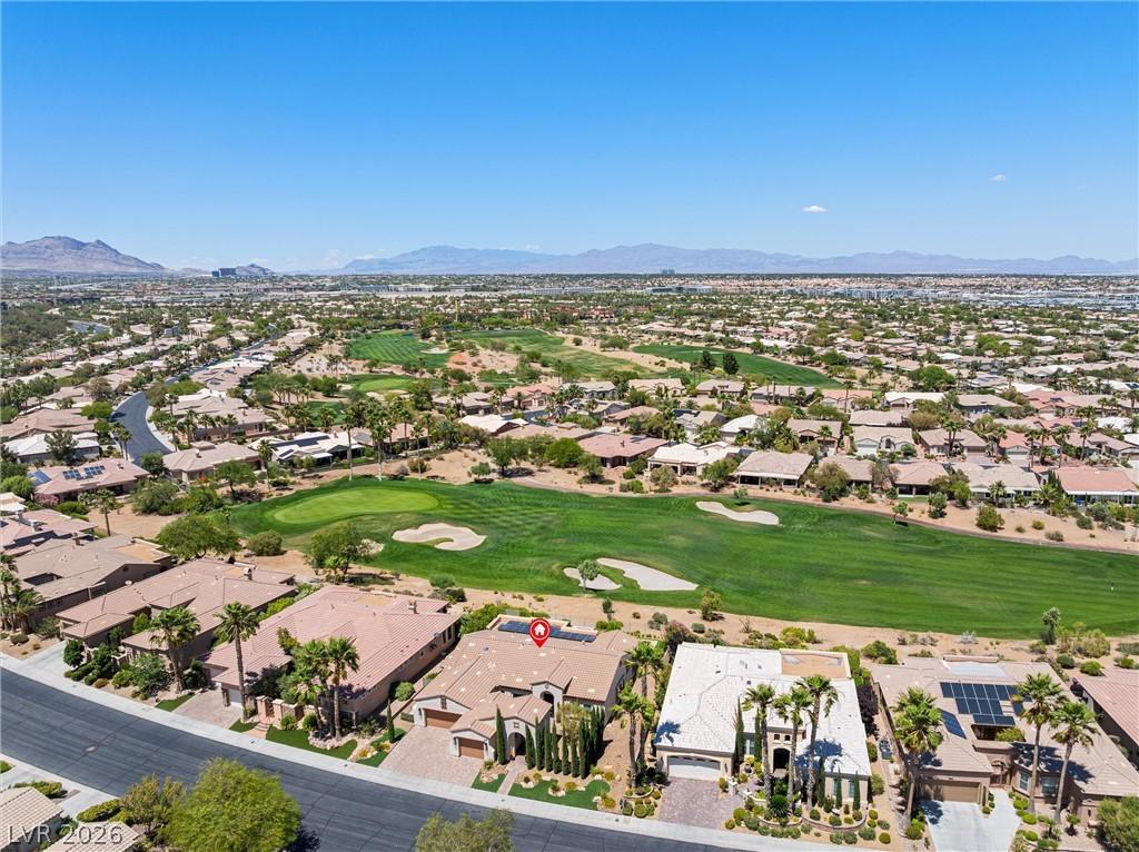 Image 4: An aerial perspective reveals a vibrant neighborho