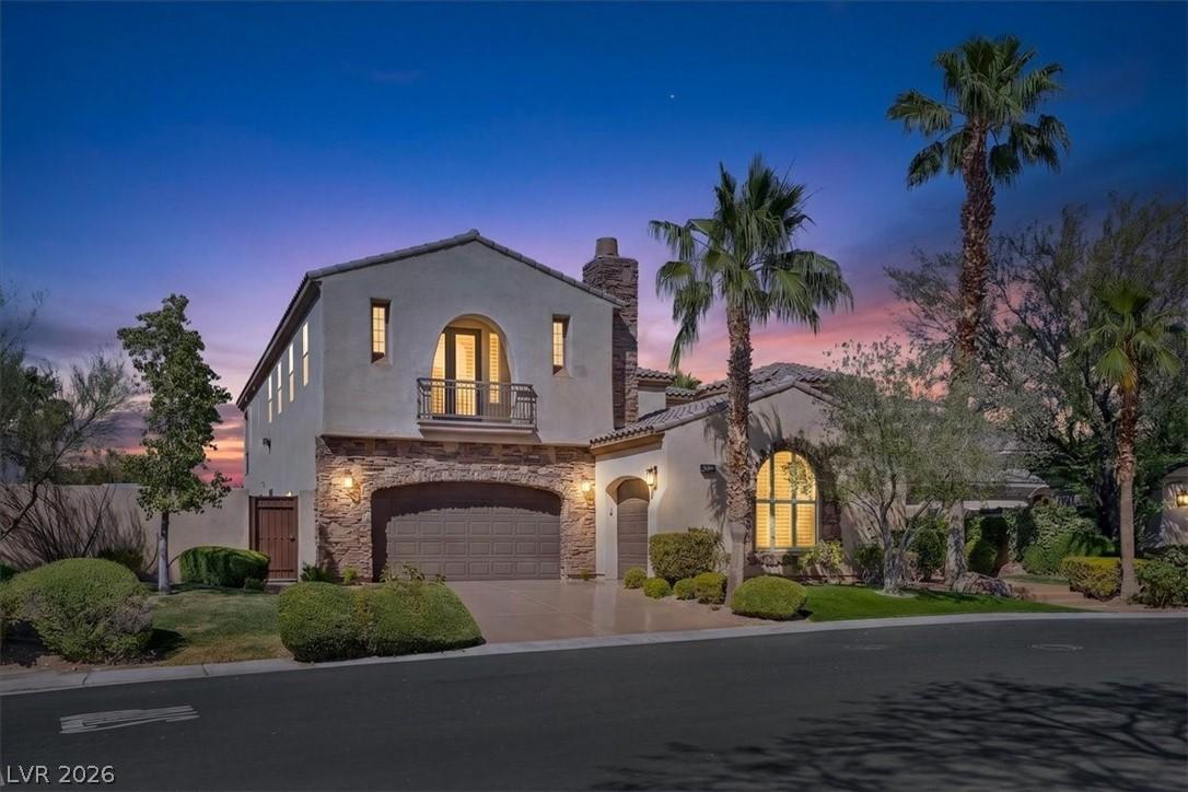 Image 1: A striking exterior presents with a stone facade,