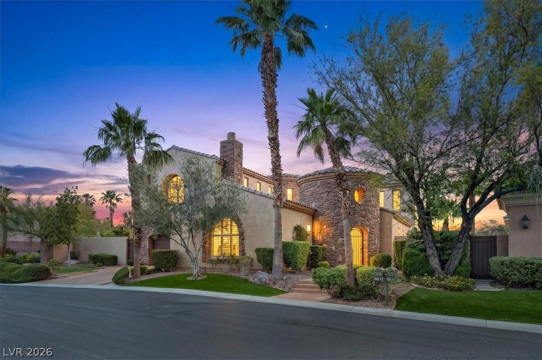 Image 2: A grand estate with exquisite stone and stucco fin