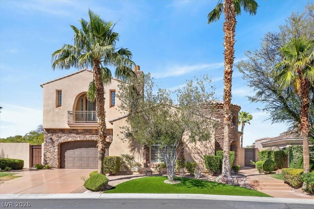 Image 4: A Mediterranean-style residence with graceful arch