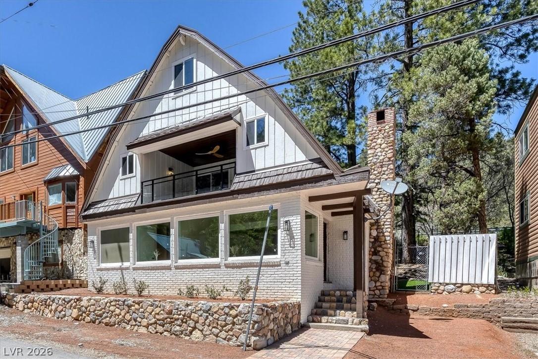 Image 2: This charming residence features distinct architec