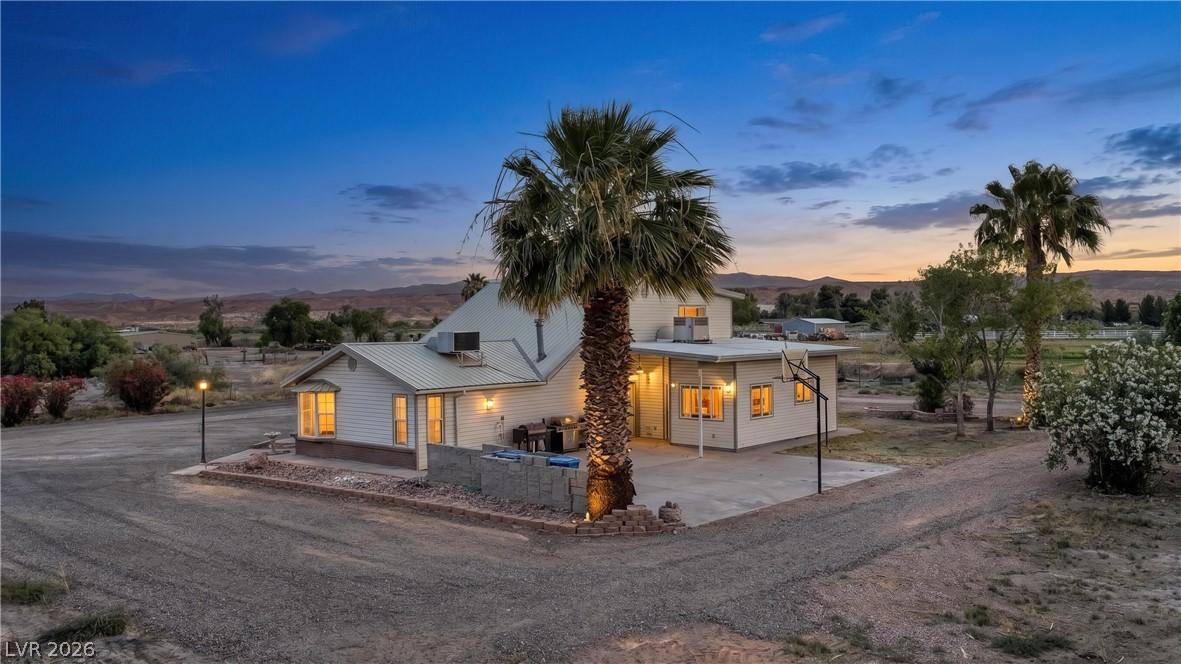Image 3: This captivating home offers serene views, a perfe