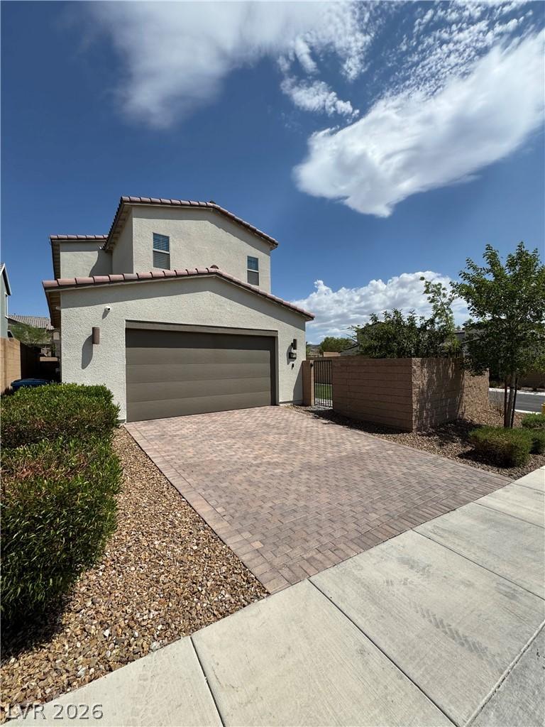 Image 1: Paver driveway off the rear of the home. Access to