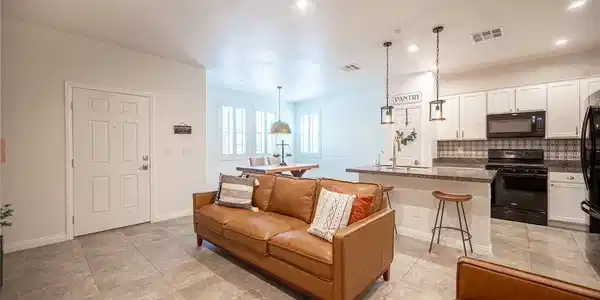 Image 3: A row of modern townhouses presents welcoming entr