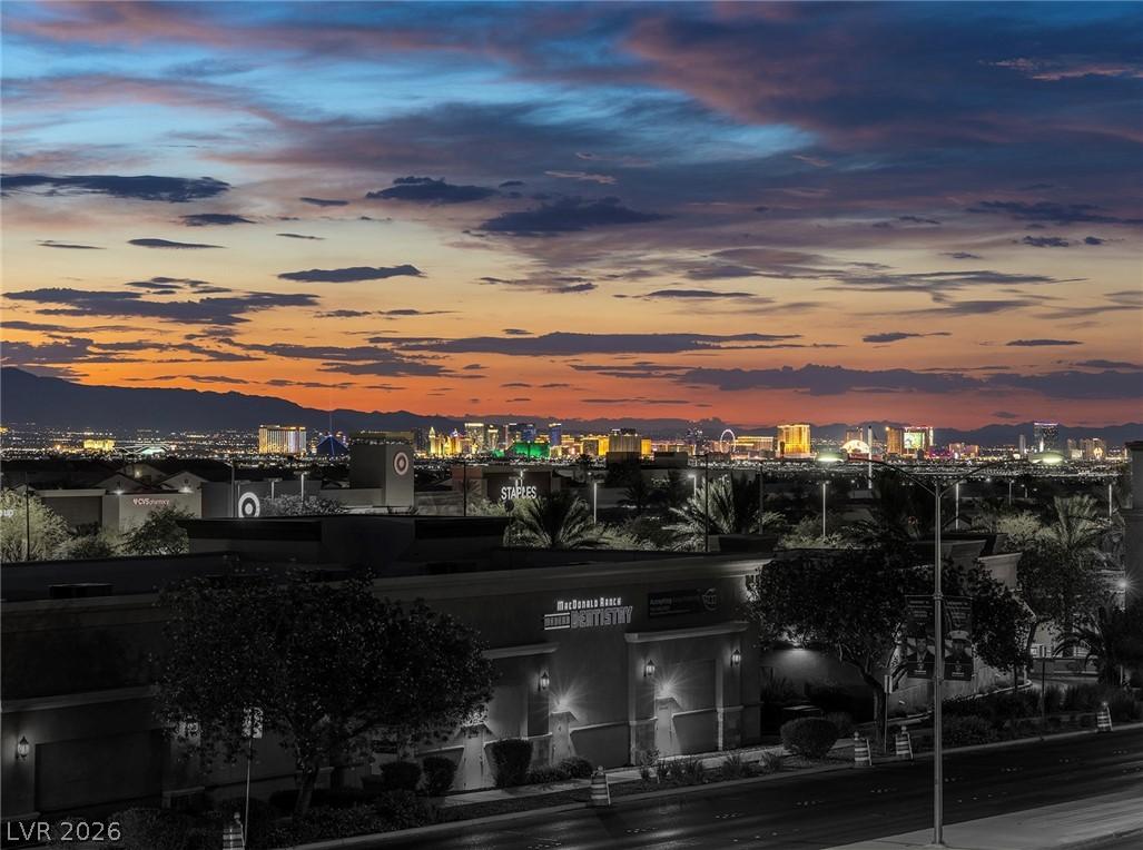 Image 4: City lights illuminate a captivating desert skylin