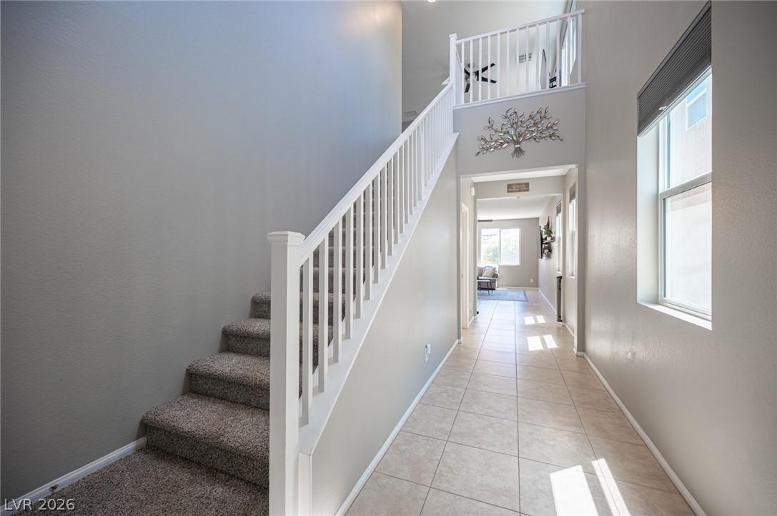 Image 3: A grand entrance welcomes guests with high ceiling