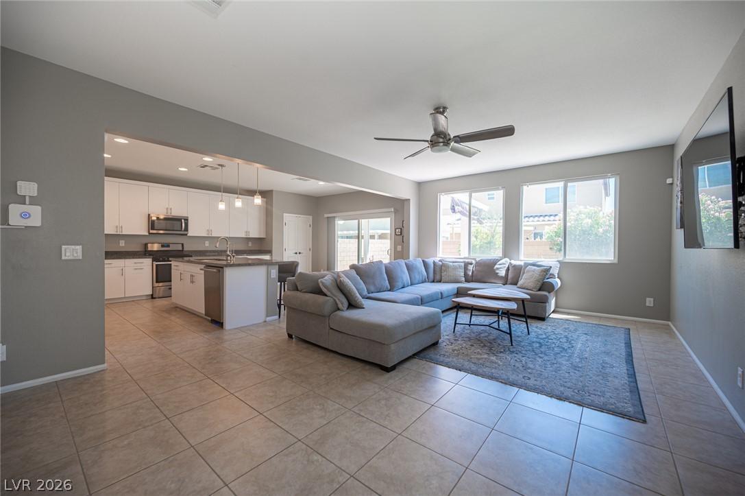 Image 4: An open-concept great room offers seamless flow be