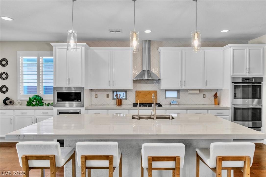 Image 3: A pristine culinary space features an inviting kit