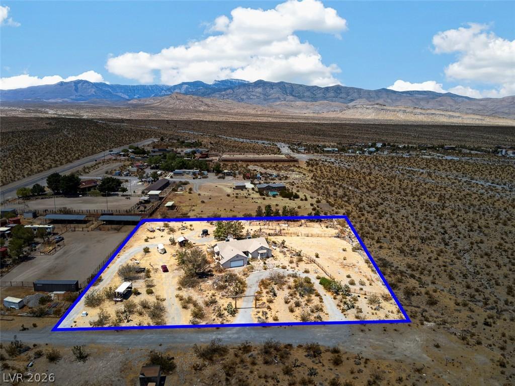 Image 2: A desert oasis with a private residence and vast s