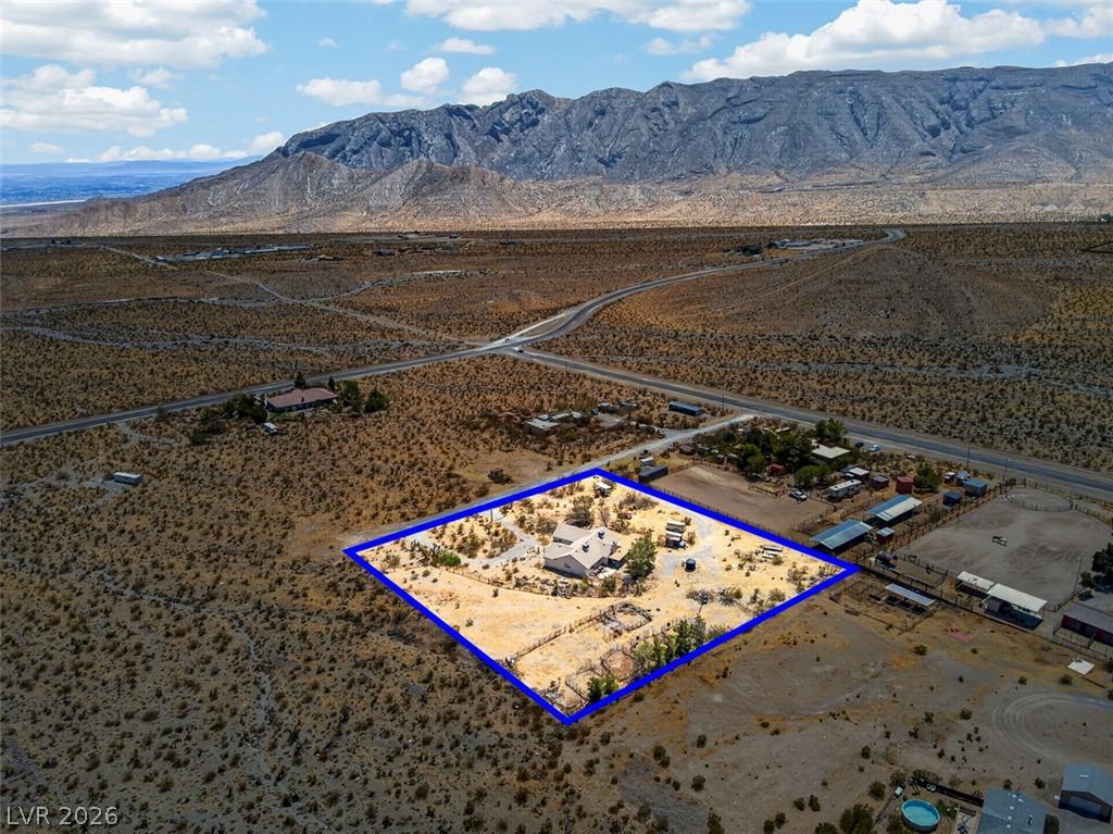 Image 3: A desert oasis home, bordered by a distinct proper