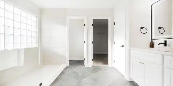 Image 2: Large grey slate-look floor tiles anchor this mode