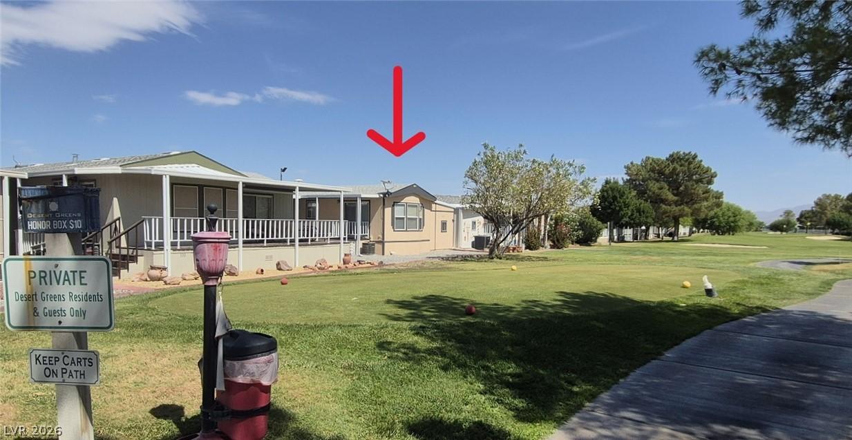 Image 2: Golf course living awaits with this residence feat