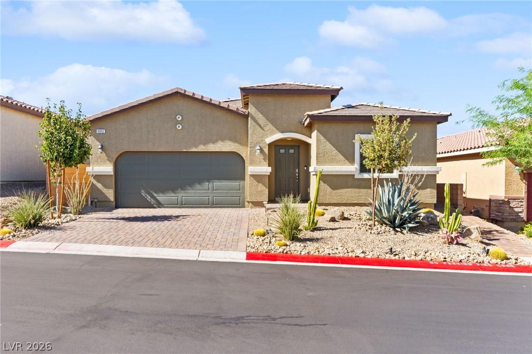 Image 1: A desert-friendly landscape accents the appealing