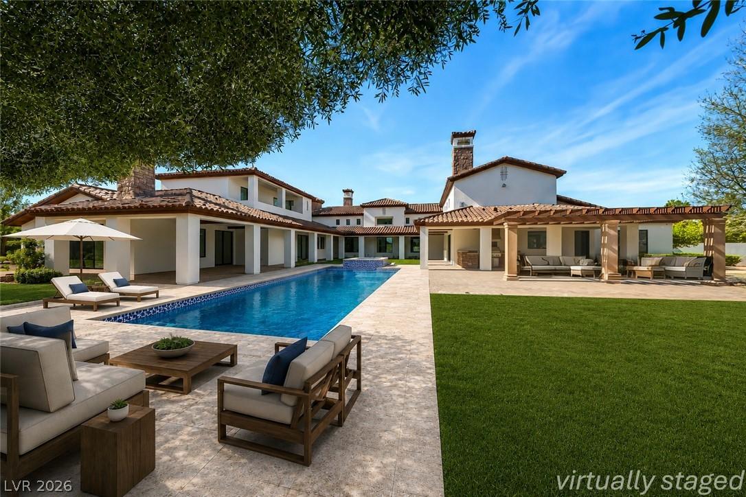 Image 1: 1140 JULIE RD HENDERSON NV 89002. An opulent, spra