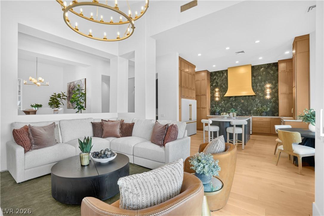 Image 2: An open concept living area seamlessly blends into