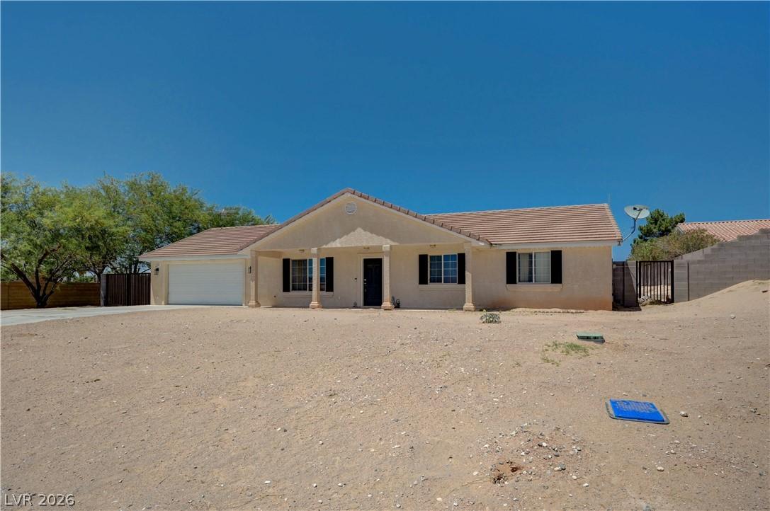 Image 4: A desert oasis awaits with this single-story resid