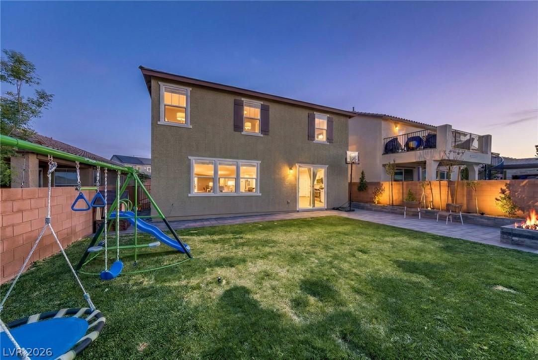 Image 3: This spacious backyard provides ample room for lei