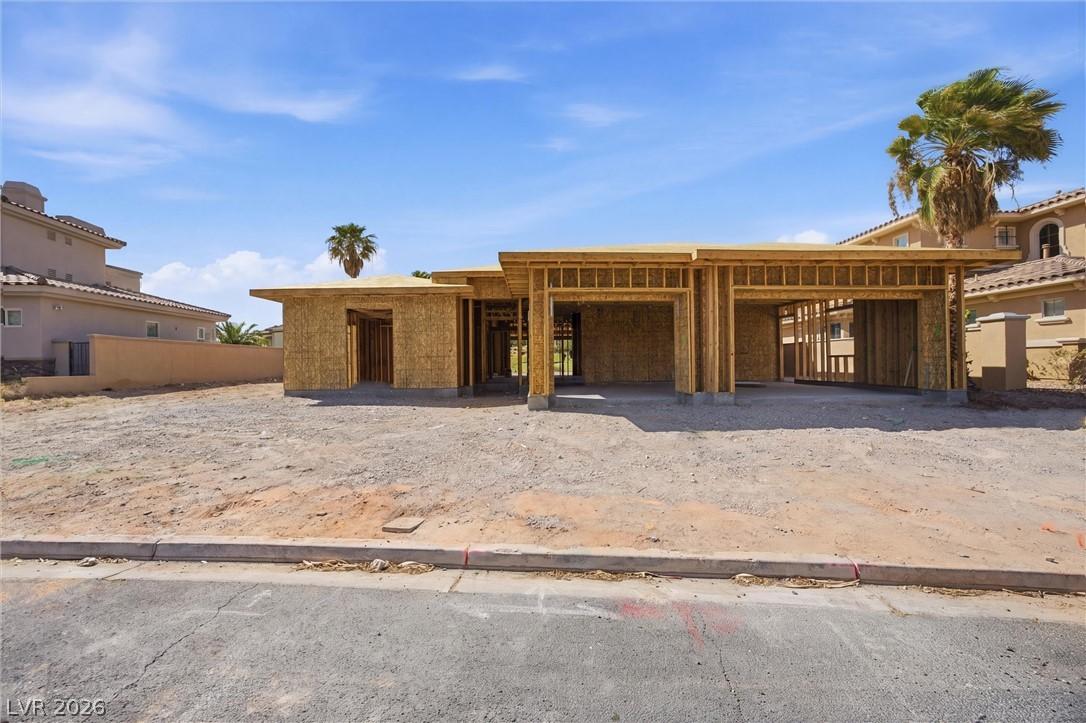 Image 2: A new construction home with an attached garage aw