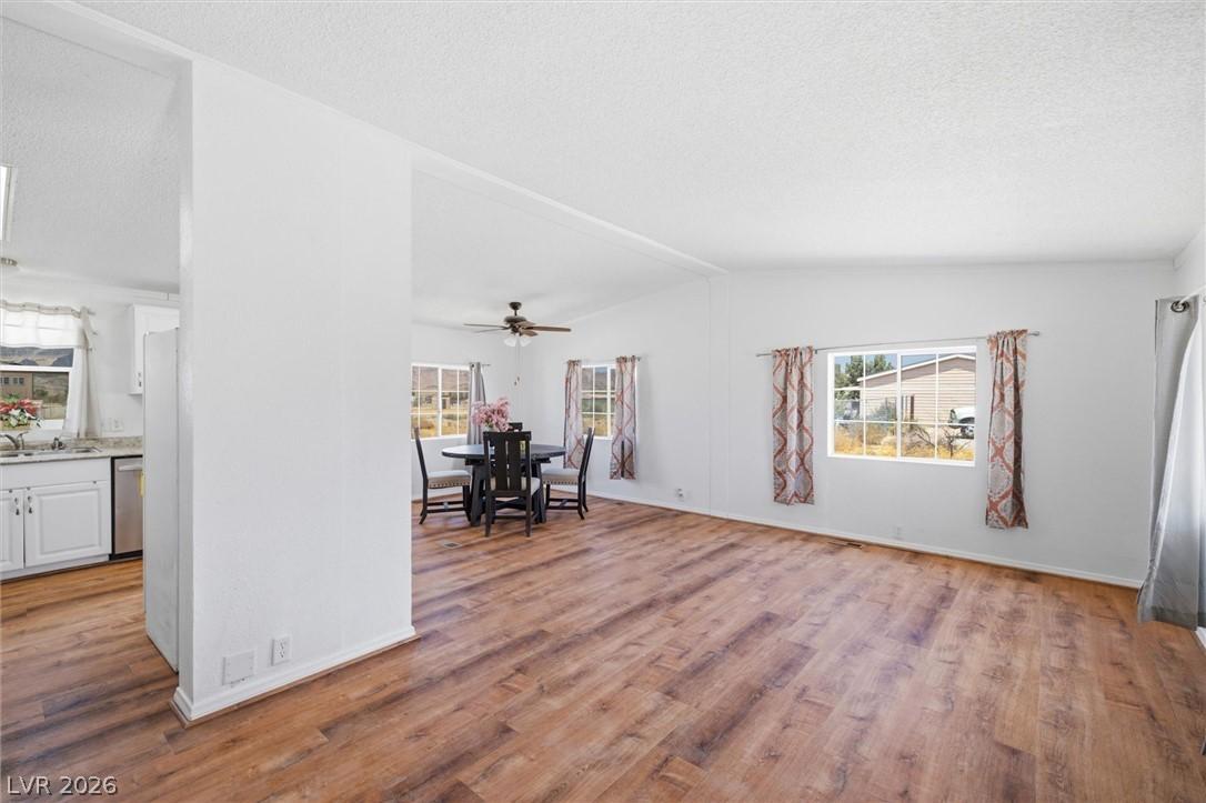 Image 4: An open floorplan seamlessly connects the living a