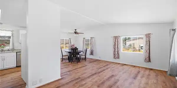 Image 4: An open floorplan seamlessly connects the living a