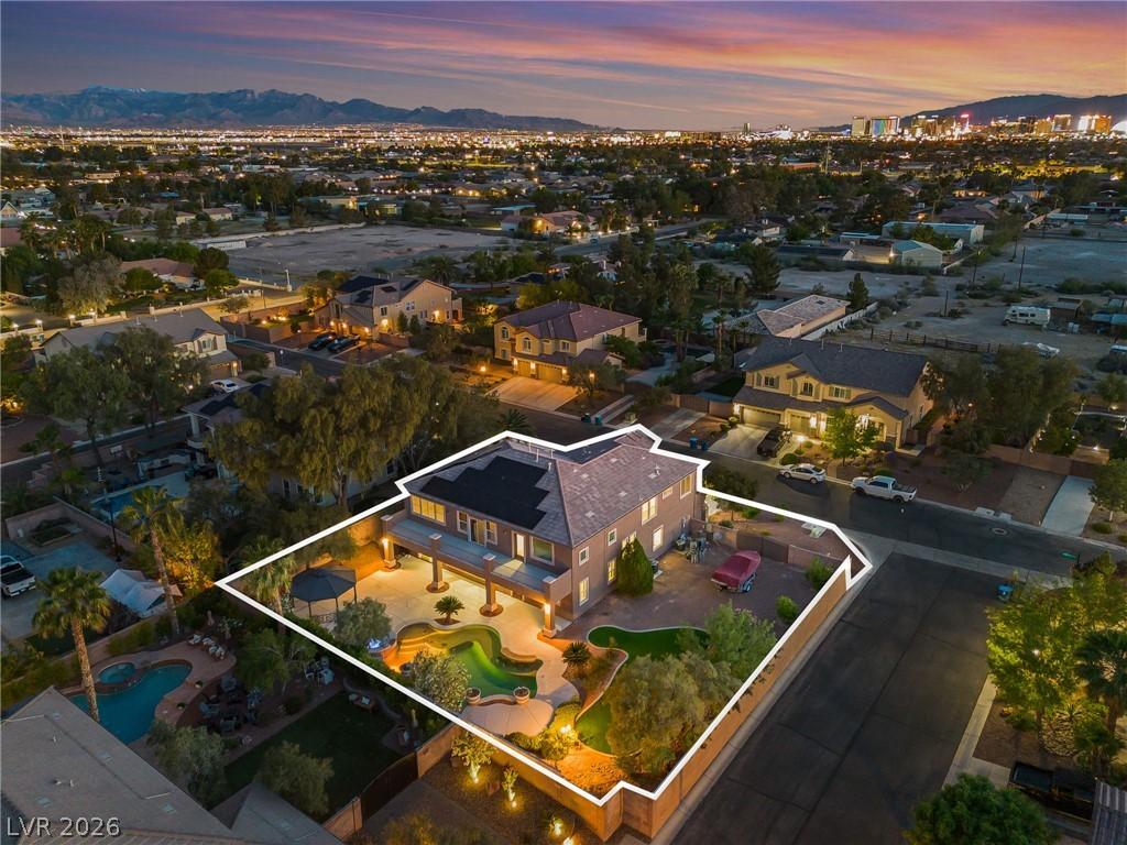 Image 4: An aerial perspective reveals a private pool oasis