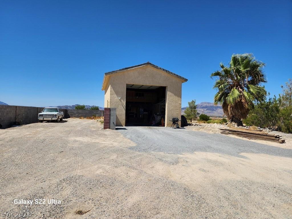 Image 2: View of RV Garage 
outdoor structure with a mount