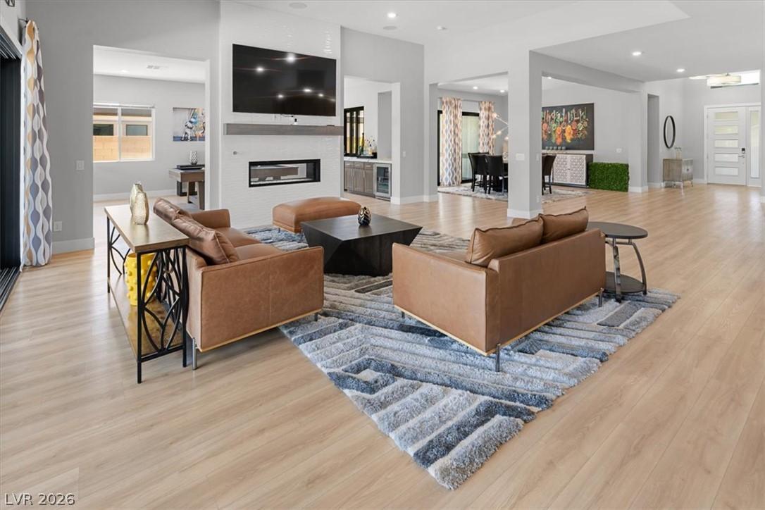 Image 4: A contemporary open-concept layout seamlessly conn