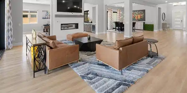 Image 4: A contemporary open-concept layout seamlessly conn