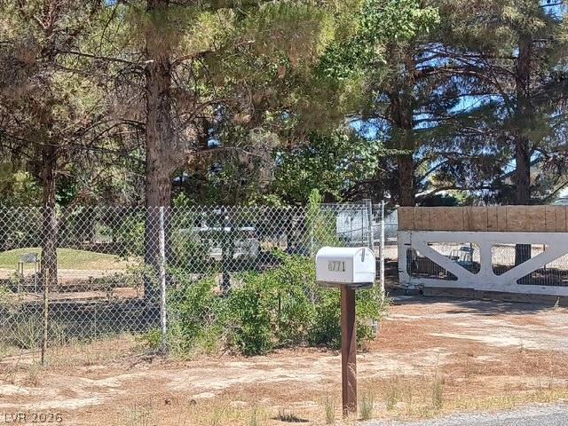 Image 4: A robust chain link fence provides security and de