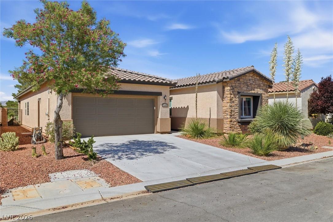 Image 2: A well-maintained desert-style dwelling presents a