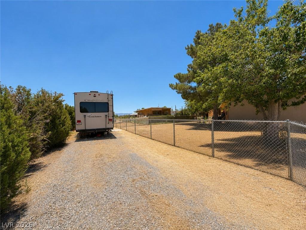 Image 3: A fenced yard provides secure outdoor living space