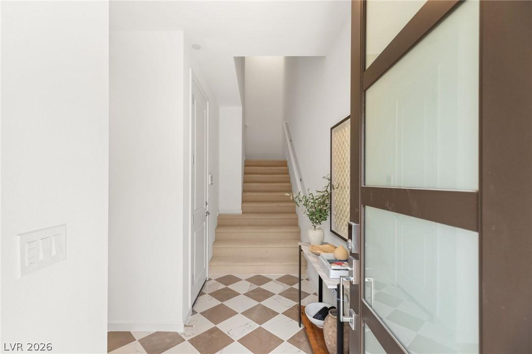 Image 3: Entry with tile patterned floors